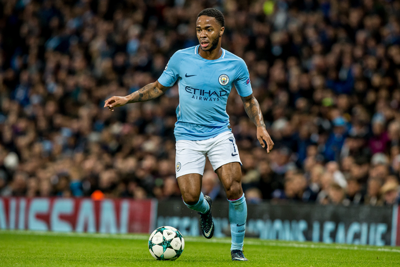 Raheem Sterling playing for Manchester City.