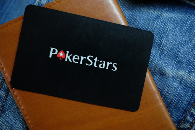 PokerStars logo against a leather case