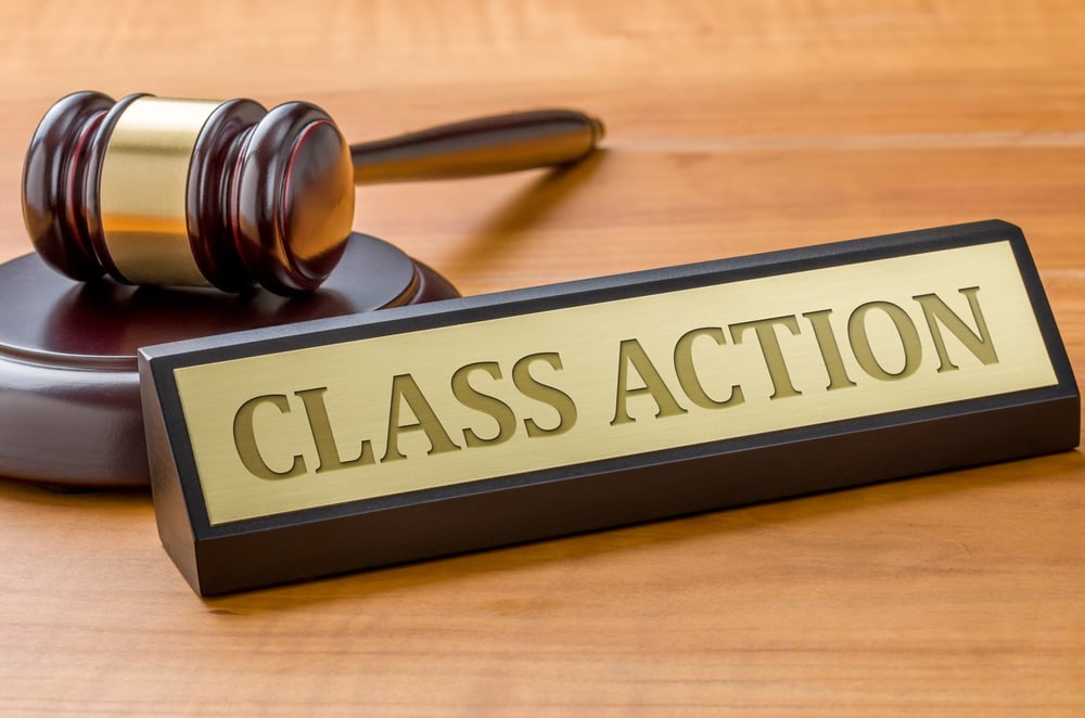 A judge's gavel next to a label reading Class Action