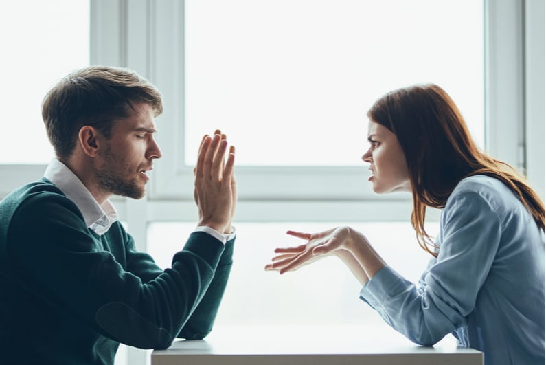 man and woman arguing