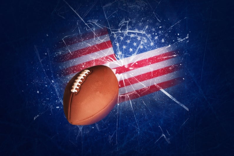 NFL ball on ice/US flag background